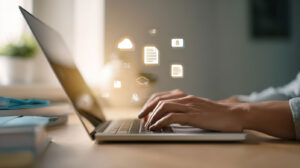 Laptop Typing With Icons Image