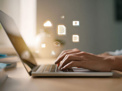 Laptop Typing With Icons Image