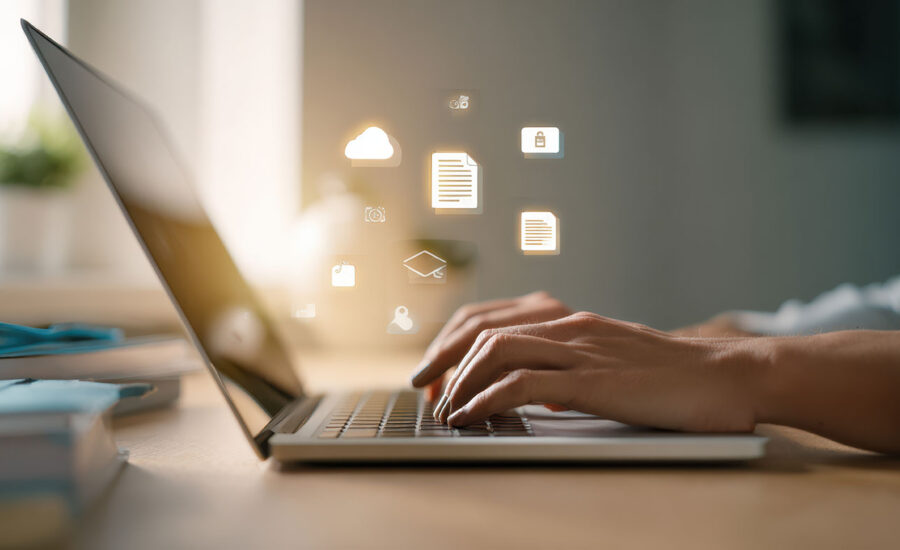 Laptop Typing With Icons Image