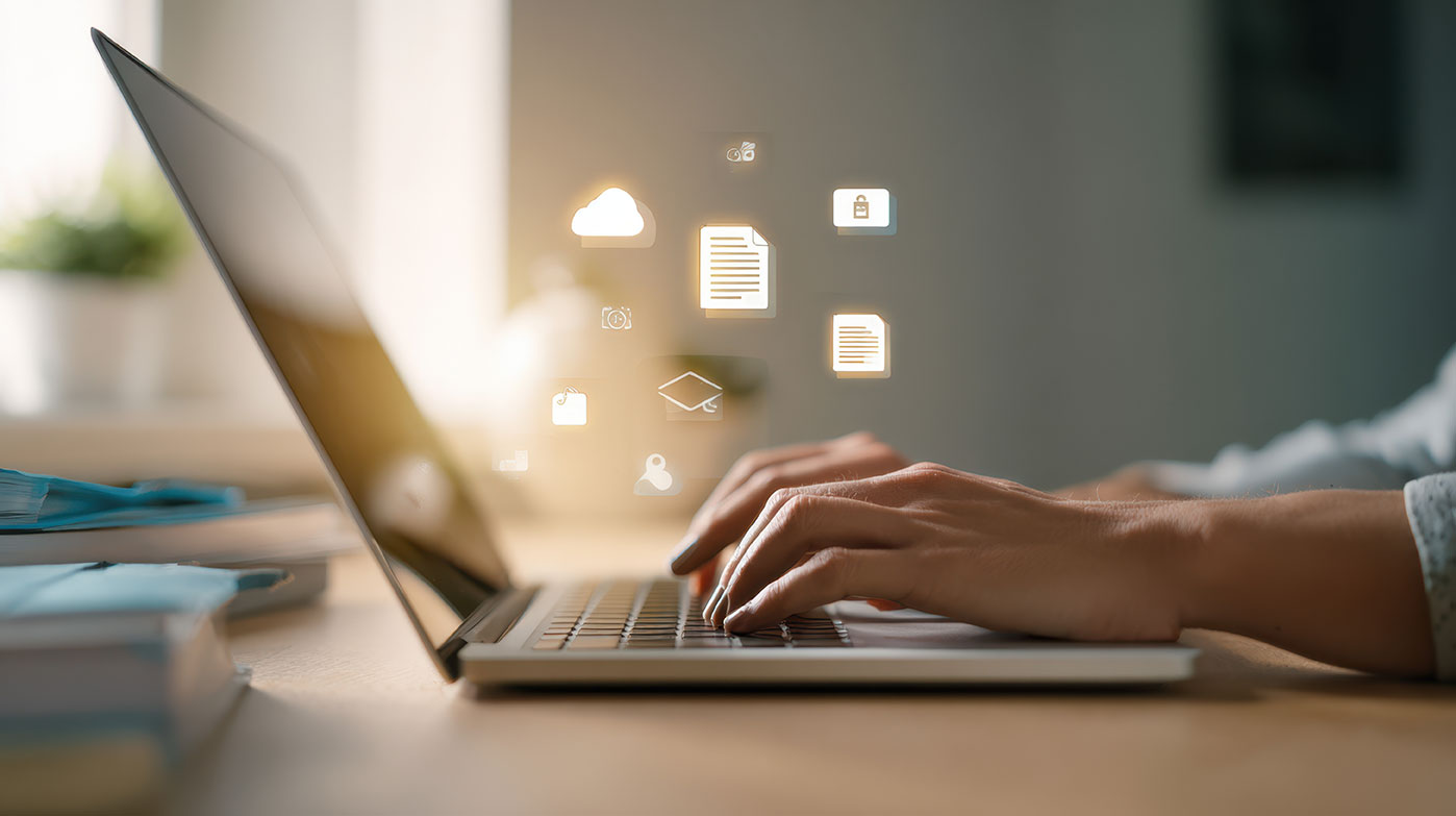 Laptop Typing With Icons Image